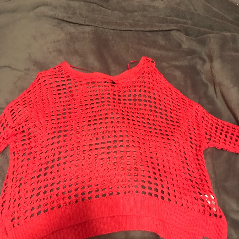 A pink express sweater.